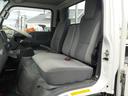 　１．５ｔ積　平ボディ４ＷＤ　全低床　５ＭＴ　切替付き４ＷＤ　ダブルタイヤ　ターボ　１０尺平ボディ　荷台床ステンレス板張り　エアコン　パワステ　キーレス付　三方開（54枚目）