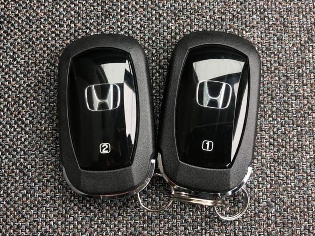 フリード eHEVエアー 保証書/純正 8インチ ナビ/ホンダセンシング/両側電動スライドドア/車線逸脱防止支援システム/登録済未使用車/ヘッドランプ LED/USBジャック/Bluetooth接続/EBD付ABS 禁煙車(29枚目)