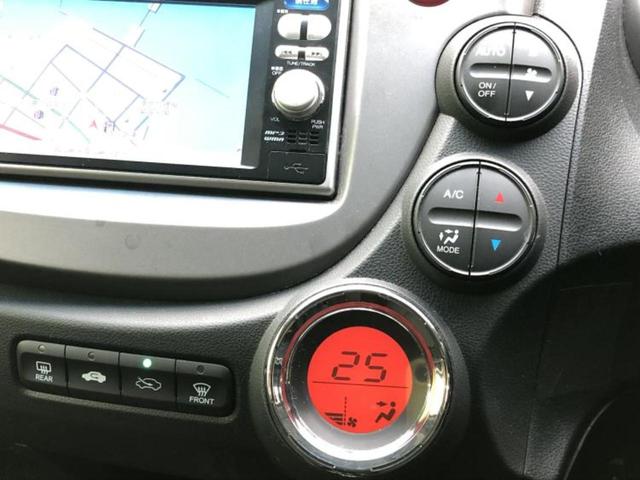フィット １５Ｘ　純正　ＳＤナビ／シートヒーター　前席／ＥＴＣ／ＥＢＤ付ＡＢＳ／クルーズコントロール／ワンセグＴＶ／ＤＶＤ／エアバッグ　運転席／エアバッグ　助手席／パワーウインドウ／キーレスエントリー／オートエアコン（28枚目）