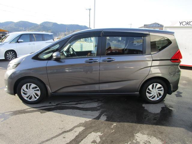 フリード Ｇ・ホンダセンシング　社外８インチナビ　バックカメラ　ＥＴＣ　前後ドライブレコーダー　プッシュスタート　スマートキー　両側パワースライドドア（4枚目）