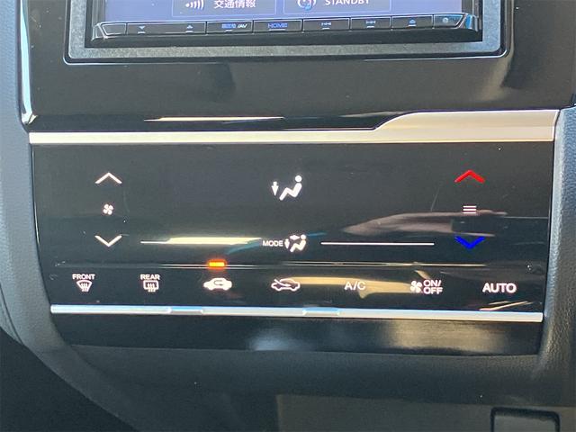 フィットハイブリッド Ｆコンフォートエディション　ハイブリッド　ＥＴＣ　バックカメラ　ナビ　ＴＶ　レーンアシスト　衝突被害軽減システム　オートライト　スマートキー　アイドリングストップ　シートヒーター　ＡＴ　盗難防止システム　衝突安全ボディ　ＣＤ（6枚目）