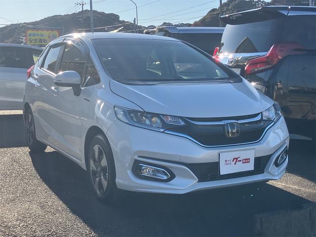 フィットハイブリッド Ｆコンフォートエディション　ハイブリッド　ＥＴＣ　バックカメラ　ナビ　ＴＶ　レーンアシスト　衝突被害軽減システム　オートライト　スマートキー　アイドリングストップ　シートヒーター　ＡＴ　盗難防止システム　衝突安全ボディ　ＣＤ（13枚目）