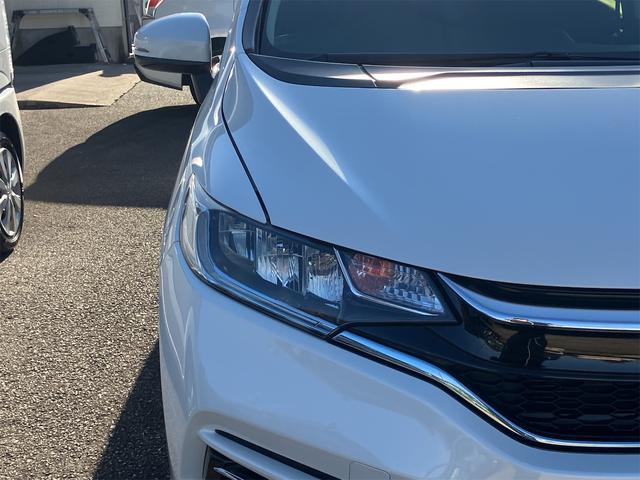 フィットハイブリッド Ｆコンフォートエディション　ハイブリッド　ＥＴＣ　バックカメラ　ナビ　ＴＶ　レーンアシスト　衝突被害軽減システム　オートライト　スマートキー　アイドリングストップ　シートヒーター　ＡＴ　盗難防止システム　衝突安全ボディ　ＣＤ（14枚目）