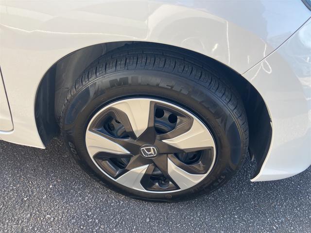 フィットハイブリッド Ｆコンフォートエディション　ハイブリッド　ＥＴＣ　バックカメラ　ナビ　ＴＶ　レーンアシスト　衝突被害軽減システム　オートライト　スマートキー　アイドリングストップ　シートヒーター　ＡＴ　盗難防止システム　衝突安全ボディ　ＣＤ（19枚目）