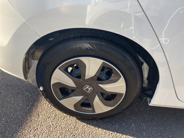 フィットハイブリッド Ｆコンフォートエディション　ハイブリッド　ＥＴＣ　バックカメラ　ナビ　ＴＶ　レーンアシスト　衝突被害軽減システム　オートライト　スマートキー　アイドリングストップ　シートヒーター　ＡＴ　盗難防止システム　衝突安全ボディ　ＣＤ（20枚目）