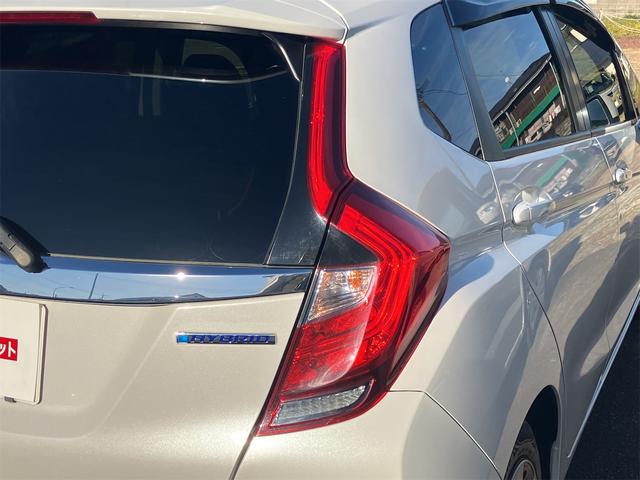 フィットハイブリッド Ｆコンフォートエディション　ハイブリッド　ＥＴＣ　バックカメラ　ナビ　ＴＶ　レーンアシスト　衝突被害軽減システム　オートライト　スマートキー　アイドリングストップ　シートヒーター　ＡＴ　盗難防止システム　衝突安全ボディ　ＣＤ（31枚目）