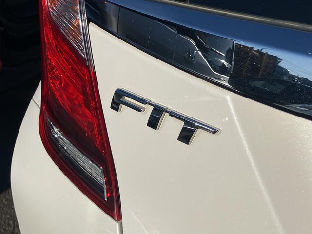 フィットハイブリッド Ｆコンフォートエディション　ハイブリッド　ＥＴＣ　バックカメラ　ナビ　ＴＶ　レーンアシスト　衝突被害軽減システム　オートライト　スマートキー　アイドリングストップ　シートヒーター　ＡＴ　盗難防止システム　衝突安全ボディ　ＣＤ（33枚目）