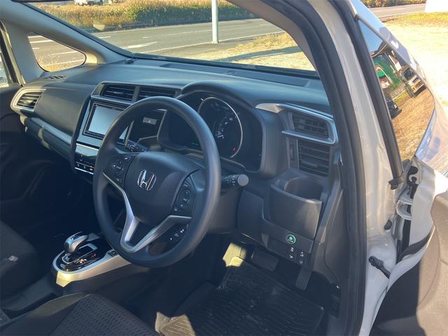 フィットハイブリッド Ｆコンフォートエディション　ハイブリッド　ＥＴＣ　バックカメラ　ナビ　ＴＶ　レーンアシスト　衝突被害軽減システム　オートライト　スマートキー　アイドリングストップ　シートヒーター　ＡＴ　盗難防止システム　衝突安全ボディ　ＣＤ（58枚目）