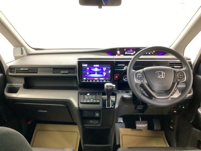ステップワゴンスパーダ スパーダホンダセンシング　メモリーナビ　フルセグ　リアカメラ　ＥＴＣ　デュアルエアコン　スマ鍵　イモビ　ターボ車　クルコン　横滑り防止システム　ＡＡＣ　地デジＴＶ　ＬＥＤヘッドライ　キーレス　三列シート　ＤＶＤ再生可　ＡＢＳ（2枚目）
