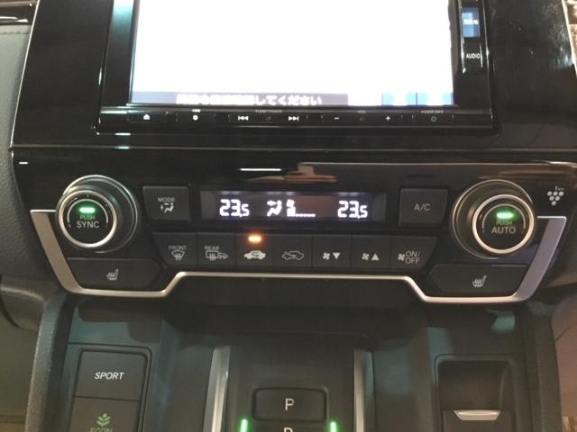 ＣＲ－Ｖハイブリッド ｅ：ＨＥＶＥＸ・マスターピース　メモリーナビ　リアカメラ　ＥＴＣ　サンル－フ　Ｂカメラ　革シート　フルセグテレビ　シートヒーター　電動シート　衝突軽減ブレーキ　ＬＥＤヘッド　クルコン　キーレス　横滑り防止装置　スマートキー（23枚目）