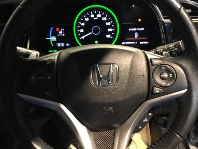 シャトル ハイブリッドＸホンダセンシング　リアカメラ　ＥＴＣ　シートヒータ　横滑抑制　リヤカメラ　スマ－トキ－　イモビ　ＴＶナビ　サイドエアバッグ　キーレス　ＤＶＤ再生機能　ＥＣＯＮ　クルコン　パワーウィンドウ　Ｗエアバック　エアコン　ＡＢＳ（3枚目）