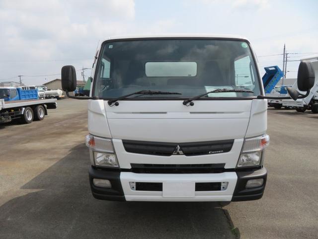 キャンター 　３．５ｔ回転式ダンプ式塵芥車６．５立米　新明和　連続スイッチ付（3枚目）