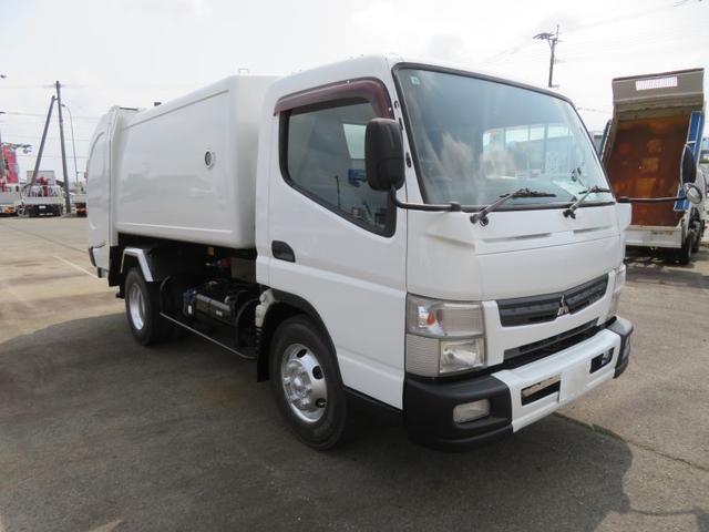 キャンター 　３．５ｔ回転式ダンプ式塵芥車６．５立米　新明和　連続スイッチ付（4枚目）