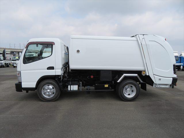 キャンター 　３．５ｔ回転式ダンプ式塵芥車６．５立米　新明和　連続スイッチ付（9枚目）
