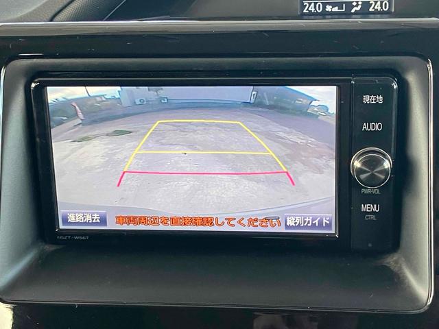 ヴォクシー ＺＳ　ＥＴＣ　バックカメラ　ナビ　ＴＶ　両側スライド・片側電動　オートライト　ＬＥＤヘッドランプ　スマートキー　アイドリングストップ　電動格納ミラー　３列シート　ＣＶＴ　アルミホイール　ＣＤ（4枚目）