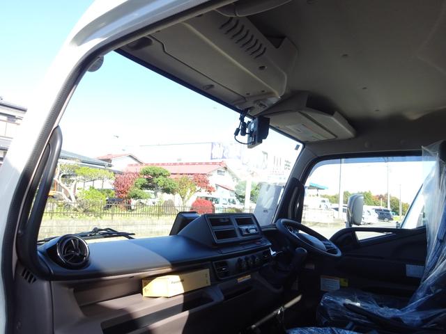 キャンター セルフローダー 積載車 3t 極東フラトップゼロ 荷台未使用 左右アオリ開閉 5速マニュアル 衝突被害軽減ブレーキシステム 左側電動格納ミラー スマートキー ETC フォグランプ バックカメラ(64枚目)