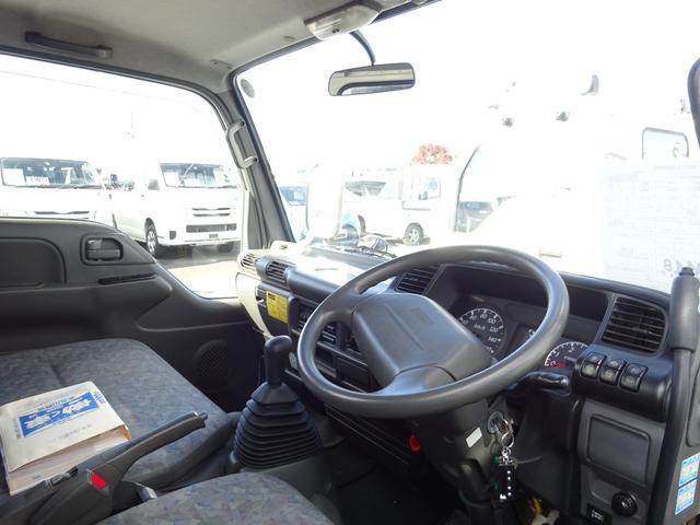 アトラストラック 　全低床　ダンプ　柱なし　２ｔ　５速マニュアル　新明和　ワンオーナー　左側電動格納ミラー　エアコン　パワステ　パワーウィンドウ　ドアバイザー（25枚目）