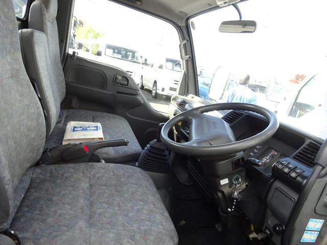 アトラストラック 　全低床　ダンプ　柱なし　２ｔ　５速マニュアル　新明和　ワンオーナー　左側電動格納ミラー　エアコン　パワステ　パワーウィンドウ　ドアバイザー（26枚目）