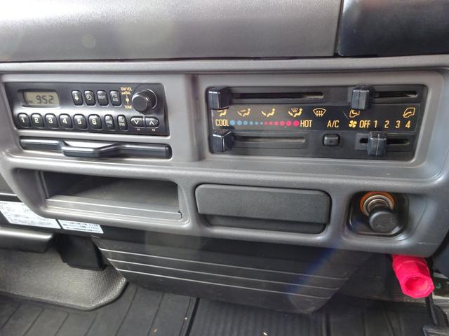 アトラストラック 　全低床　ダンプ　柱なし　２ｔ　５速マニュアル　新明和　ワンオーナー　左側電動格納ミラー　エアコン　パワステ　パワーウィンドウ　ドアバイザー（38枚目）