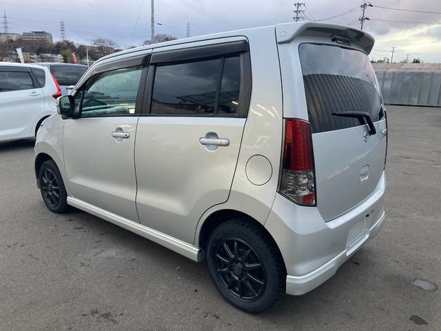 ワゴンR FXリミテッド (車検2年)基本装備フル装備 Pスタート レベライザー HIDヘッドライト 電格ミラー 本革S ABS PW PS ETC 純正SDナビ 社外14インチAW付ST装着 タイミングチェーンエンジン(14枚目)