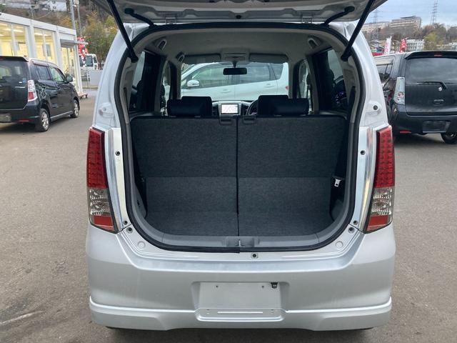 ワゴンR FXリミテッド (車検2年)基本装備フル装備 Pスタート レベライザー HIDヘッドライト 電格ミラー 本革S ABS PW PS ETC 純正SDナビ 社外14インチAW付ST装着 タイミングチェーンエンジン(17枚目)