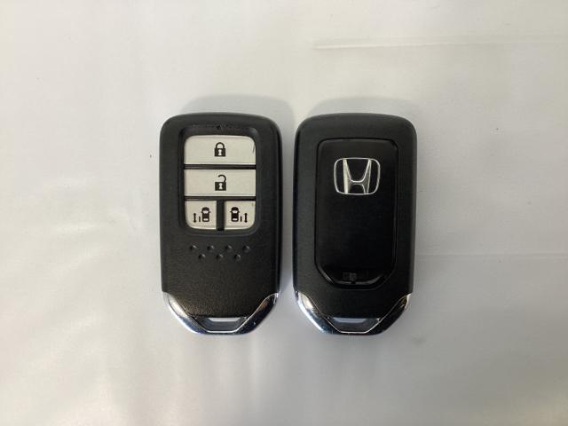 ステップワゴン Gホンダセンシング 光触媒抗菌消臭施工済 3列シート スマートキー&プッシュスタート フルセグTV 衝突被害軽減システム オートクルーズコントロール DVD アイドリングストップ 横滑り防止装置 エアバッグ ナビTV(13枚目)