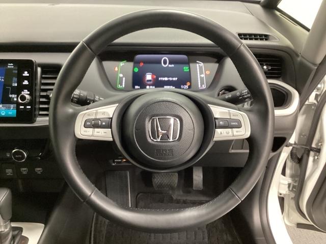 フィット e:HEVホーム 中古スタッドレスタイヤ、純正メモリーナビ、ドライブレコーダー前後装着+ETC付 当社デモカー 前後誤発進抑制機能 クリソナ 助手席エアバッグ 運転席エアバッグ 1オナ アイドリングストップ USB接続(14枚目)