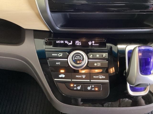 フリードハイブリッド ハイブリッド・Ｇホンダセンシング　６人乗り　ワンオーナー車　メモリーナビ　フルセグ　Ｂｌｕｅｔｏｏｔｈ　バックカメラ　ＥＴＣ　オートライト機能付ＬＥＤヘッドライト　シートヒーター　両側電動スライドドア　光触媒抗菌消臭施工済　スマキー（9枚目）