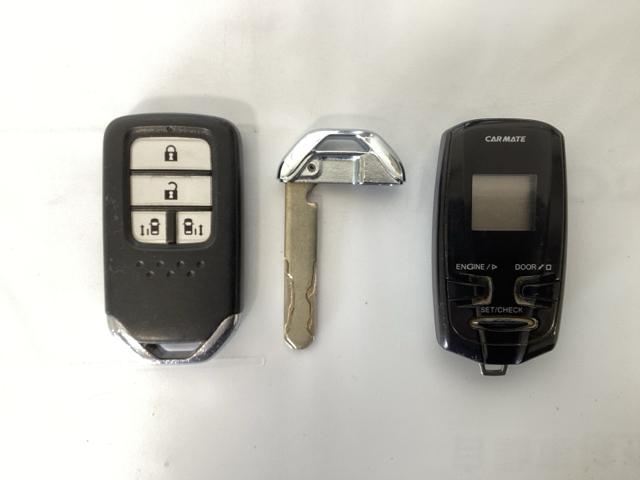 フリードハイブリッド ハイブリッド・Ｇホンダセンシング　６人乗り　ワンオーナー車　メモリーナビ　フルセグ　Ｂｌｕｅｔｏｏｔｈ　バックカメラ　ＥＴＣ　オートライト機能付ＬＥＤヘッドライト　シートヒーター　両側電動スライドドア　光触媒抗菌消臭施工済　スマキー（12枚目）