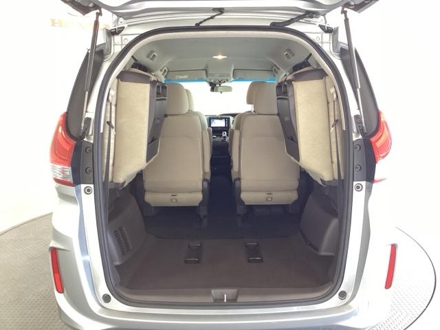 フリードハイブリッド ハイブリッド・Ｇホンダセンシング　６人乗り　ワンオーナー車　メモリーナビ　フルセグ　Ｂｌｕｅｔｏｏｔｈ　バックカメラ　ＥＴＣ　オートライト機能付ＬＥＤヘッドライト　シートヒーター　両側電動スライドドア　光触媒抗菌消臭施工済　スマキー（20枚目）