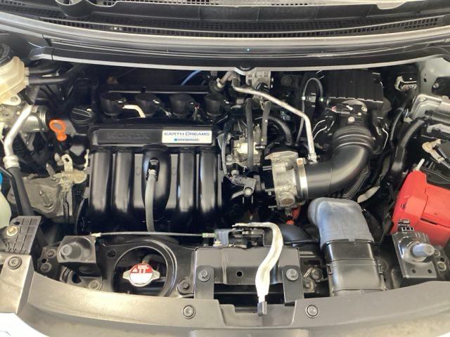 フリードハイブリッド ハイブリッド・Ｇホンダセンシング　６人乗り　ワンオーナー車　メモリーナビ　フルセグ　Ｂｌｕｅｔｏｏｔｈ　バックカメラ　ＥＴＣ　オートライト機能付ＬＥＤヘッドライト　シートヒーター　両側電動スライドドア　光触媒抗菌消臭施工済　スマキー（21枚目）