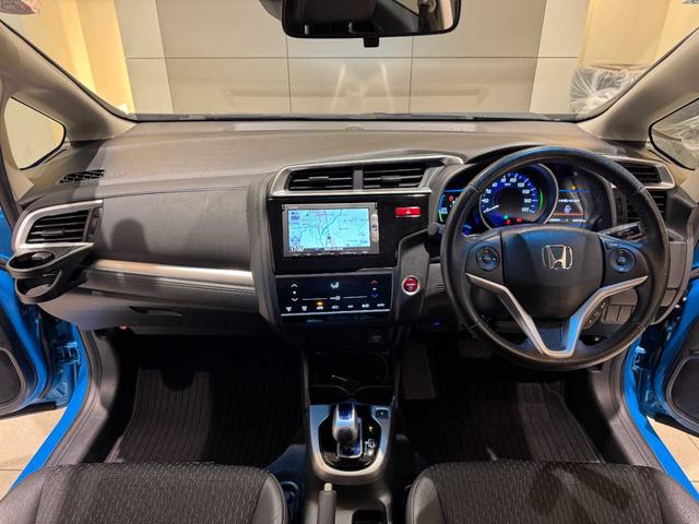 フィットハイブリッド Ｌパッケージ　ナビ（ＳＤ）　ＴＶ（ワンセグ）　バックカメラ　Ｂｌｕｅｔｏｏｔｈ　ＥＴＣ　スマートキー　ＨＩＤ　オートライトＣＤ　ＤＶＤ　ミュージックプレイヤー接続可　ドライブレコーダー（10枚目）