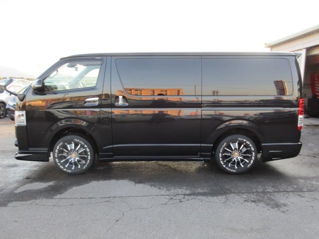 ハイエースバン スーパーGL ダークプライム 1オーナー 4WD 寒冷地仕様 社外ナビ Bカメラ 両側パワースライド モデリスタエアロ 社外エアロ 純正ルーフスポイラー ETC H20ホワイトレター LEDヘッドライト 前側フォグ AC100V(12枚目)