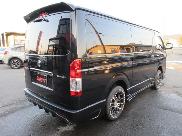 ハイエースバン スーパーGL ダークプライム 1オーナー 4WD 寒冷地仕様 社外ナビ Bカメラ 両側パワースライド モデリスタエアロ 社外エアロ 純正ルーフスポイラー ETC H20ホワイトレター LEDヘッドライト 前側フォグ AC100V(13枚目)