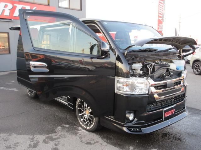 ハイエースバン スーパーGL ダークプライム 1オーナー 4WD 寒冷地仕様 社外ナビ Bカメラ 両側パワースライド モデリスタエアロ 社外エアロ 純正ルーフスポイラー ETC H20ホワイトレター LEDヘッドライト 前側フォグ AC100V(67枚目)