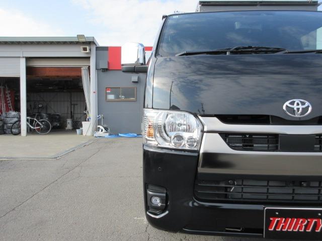 ハイエースバン ロングスーパーGL ダークプライムS 登録済未使用車 4WD 寒冷地仕様 トヨタセーフティセンス パノラミックビュー 両側パワースライド デジタルインナーミラー オートハイビーム 本革巻ステア LEDヘッドライト 前後フォグ Wエアコン(72枚目)