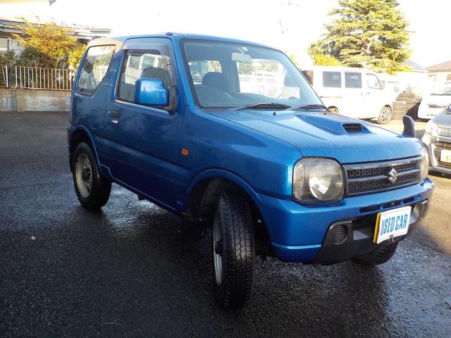 ジムニー XG 4WDターボ Wエアバック ABS キーレス 社外ナビ 地デジ DVD視聴可 CD(3枚目)