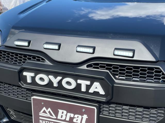 プロボックス ハイブリッドＦ　自社新車仕入れカスタム　タコマ風グリル　１インチリフトアップ　ＴＯＹＯオープンカントリーホワイトレター新品Ｒ／Ｔタイヤ　ＢＫＭヘッド／テールライト　ＷＥＤＳ１４インチ新品アルミ　グレイスシートカバー（32枚目）