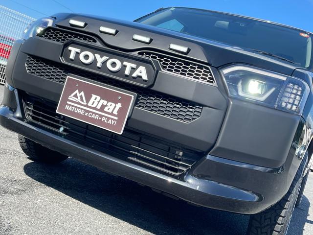 プロボックス ハイブリッドＦ　自社新車仕入れカスタム　タコマ風グリル　１インチリフトアップ　ＴＯＹＯオープンカントリーホワイトレター新品Ｒ／Ｔタイヤ　ＢＫＭヘッド／テールライト　ＷＥＤＳ１４インチ新品アルミ　グレイスシートカバー（34枚目）