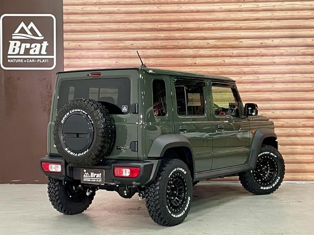 ジムニーノマド ＦＣ　リフトＵＰ　グリルブラック塗装　エクストリームＪ新品アルミホイール　ＴＯＹＯオープンカントリーＭ／Ｔ新品タイヤ　フロントカメラ　スズキセーフティ　クルコン　障害物センサー　前席シートヒーター　禁煙車（2枚目）