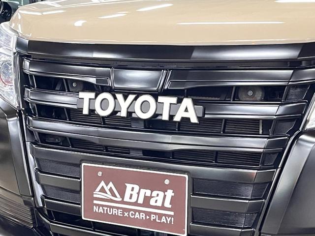 ノア ハイブリッドG 全塗装/ナチュラルベージュM ブラック塗装 モンツァジャパン新品AW マッドスターA/T新品タイヤ TOYOTAエンブレム 両側パワスラ フリップダウンモニター 純正ナビ バックカメラ シートヒーター(34枚目)