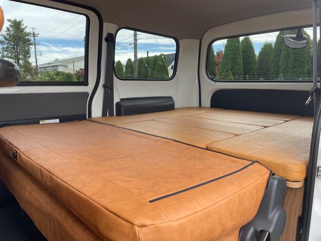 タウンエースバン GL 自社新車仕入れカスタム MGRベッドキット リフトアップ エクストリームJ新品14インチアルミホイール マキシスバックショット新品タイヤ グレイスシートカバー インテリアパネル リアヒーター スマアシ(63枚目)