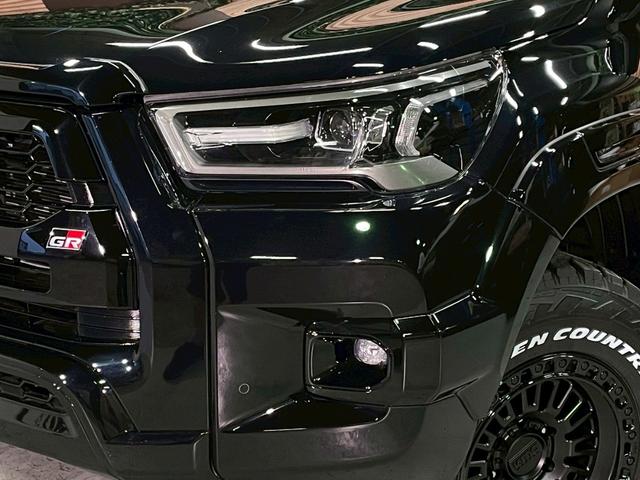 ハイラックス Ｚ　ＧＲスポーツ　リフトアップ　減衰調整式ショック　ＫＭＣ／ＡＺＴＥＣ新品アルミホイール　ＴＯＹＯオープンカントリー新品タイヤ　トノカバー　ベッドライナ　ディスプレイオーディオ　全方位カメラ　クルコン　ＥＴＣ２．０（3枚目）