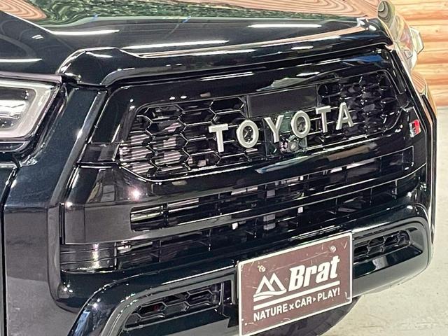ハイラックス Ｚ　ＧＲスポーツ　リフトアップ　減衰調整式ショック　ＫＭＣ／ＡＺＴＥＣ新品アルミホイール　ＴＯＹＯオープンカントリー新品タイヤ　トノカバー　ベッドライナ　ディスプレイオーディオ　全方位カメラ　クルコン　ＥＴＣ２．０（24枚目）