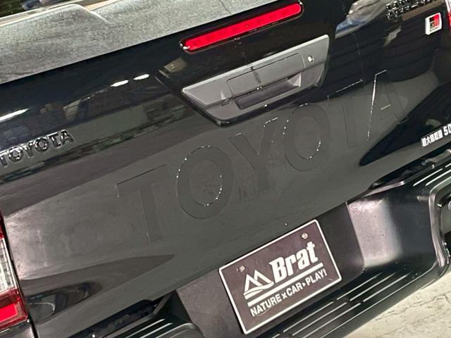 ハイラックス Ｚ　ＧＲスポーツ　リフトアップ　減衰調整式ショック　ＫＭＣ／ＡＺＴＥＣ新品アルミホイール　ＴＯＹＯオープンカントリー新品タイヤ　トノカバー　ベッドライナ　ディスプレイオーディオ　全方位カメラ　クルコン　ＥＴＣ２．０（28枚目）