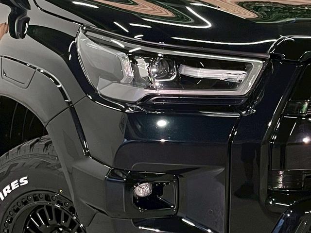 ハイラックス Ｚ　ＧＲスポーツ　リフトアップ　減衰調整式ショック　ＫＭＣ／ＡＺＴＥＣ新品アルミホイール　ＴＯＹＯオープンカントリー新品タイヤ　トノカバー　ベッドライナ　ディスプレイオーディオ　全方位カメラ　クルコン　ＥＴＣ２．０（50枚目）