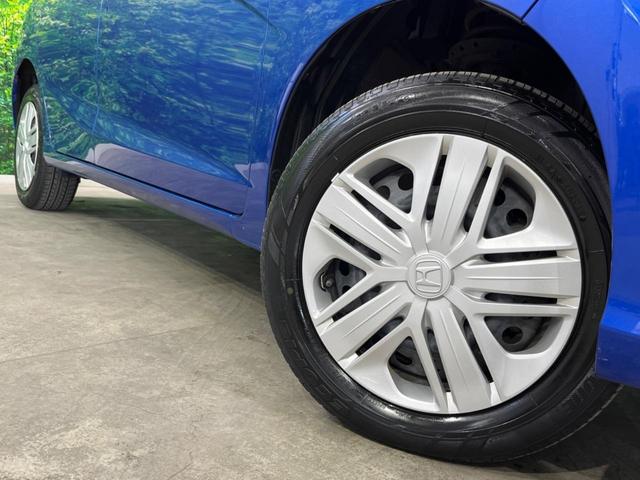 13G・L ホンダセンシング 4WD 禁煙車 純正8インチSDナビ 寒冷地仕様 ホンダセンシング レーダークルーズコントロール オートライト LEDヘッドライト ETC Bluetooth接続 フルセグTV CD&DVD再生(14枚目)
