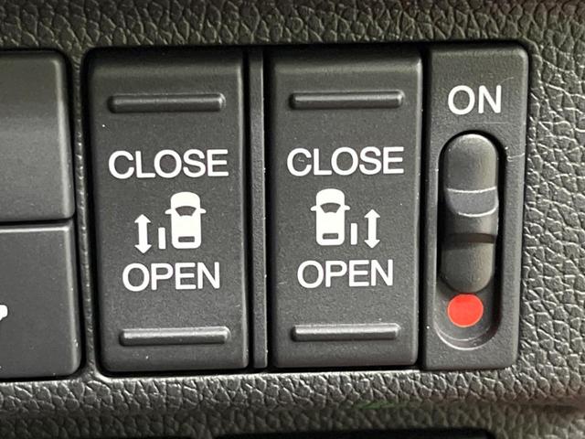 フリードハイブリッド ハイブリッド・Gホンダセンシング 4WD 両側電動ドア 純正ナビ バックカメラ 寒冷地仕様 衝突被害軽減システム レーダークルーズ 禁煙車 ハーフレザーシート スマートキー LEDヘッド ビルトインETC オートハイビーム(3枚目)