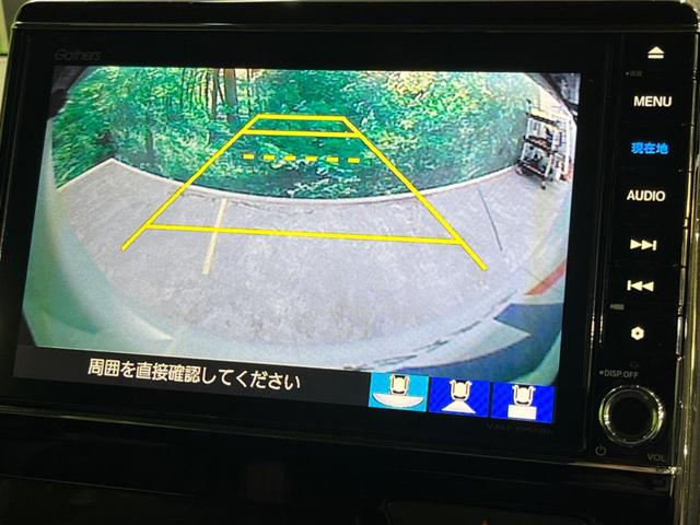Ｎ－ＢＯＸカスタム Ｇ・Ｌターボホンダセンシング　４ＷＤ　両側電動ドア　純正ＳＤナビ　バックカメラ　衝突被害軽減システム　禁煙車　ハーフレザーシート　コーナーセンサー　スマートキー　ＬＥＤヘッド　ビルトインＥＴＣ　クルコン　純正１４インチアルミ（4枚目）