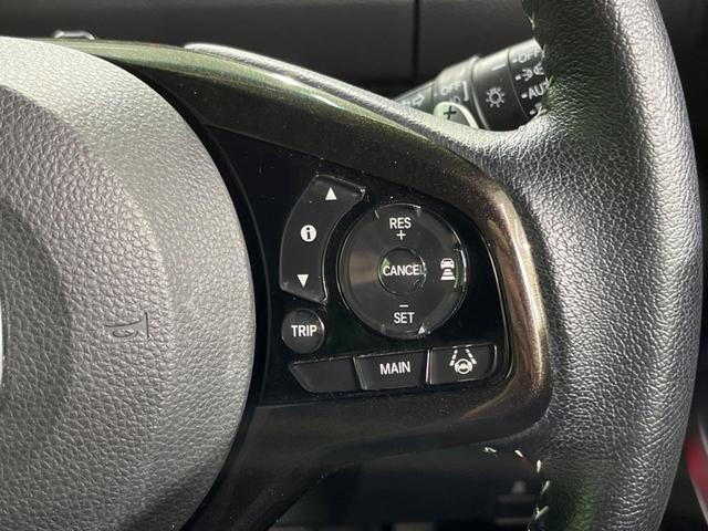 Ｎ－ＢＯＸカスタム Ｇ・Ｌターボホンダセンシング　４ＷＤ　両側電動ドア　純正ＳＤナビ　バックカメラ　衝突被害軽減システム　禁煙車　ハーフレザーシート　コーナーセンサー　スマートキー　ＬＥＤヘッド　ビルトインＥＴＣ　クルコン　純正１４インチアルミ（7枚目）